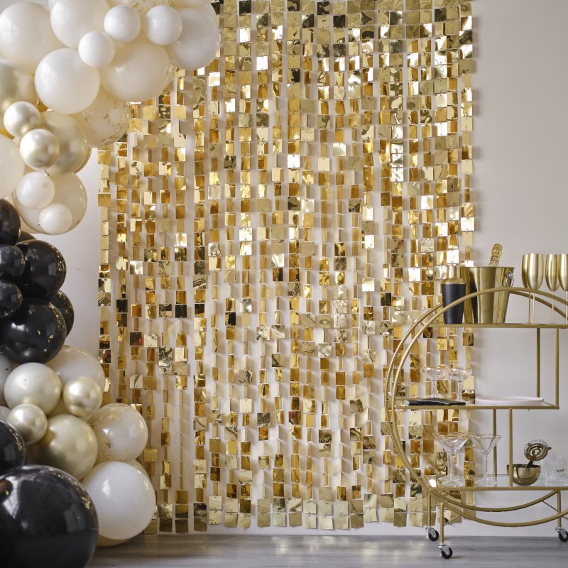 Backdrop com lantejoulas douradas